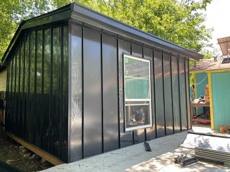 Black standing seam metal wall panels for Roof Inspection in Ammon