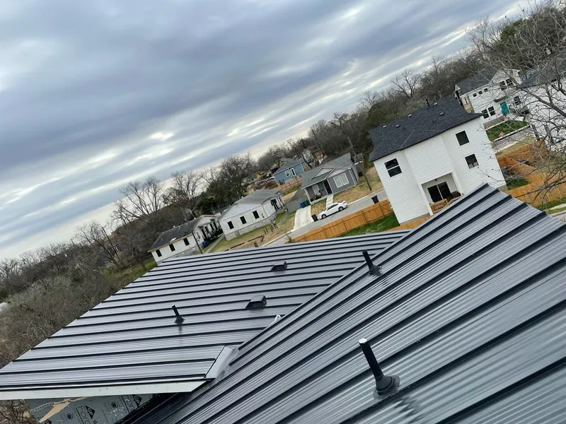 Standing seam metal roof panels with vents for Skylight Repair in Ammon